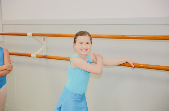 Young Dancer Smiling in Class